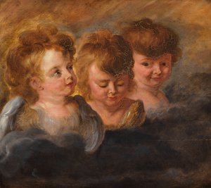 Tres cabezas de ángeles en las nubes