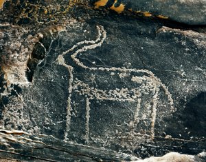 Prehistoria, arte rupestre: roca funeraria con representación de un antílope