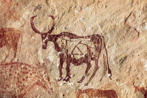 Pintura rupestre: representación de un cérvido. Cueva de Tadrart Acacus, Libia de Prehistoric Prehistoric