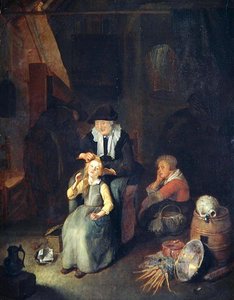 Interior de cabaña con mujer peinando el cabello de una niña