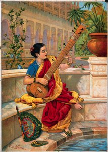 Una mujer india sentada toca el sitar junto a un estanque de jardín.