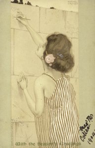 Niña escribiendo en una pared