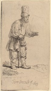Un campesino con gorro alto, de pie apoyado en un bastón de Rembrandt van Rijn