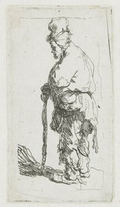 Mendigo apoyado en un bastón, mirando hacia la izquierda de Rembrandt van Rijn