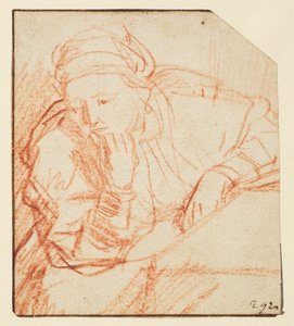 Saskia sentada en una mesa de Rembrandt van Rijn