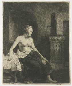 Mujer sentada a medio vestir junto a una estufa de Rembrandt van Rijn