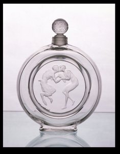 Le Baiser du Faune, botella de perfume de vidrio claro para Molinard por Lalique de Rene Jules Lalique