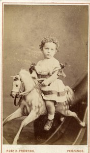Niña sentada en un caballo de juguete, 1860s de Robert H. Preston