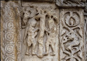 Adán y Eva. Detalle de la fachada de la Basílica, principios del siglo XII de Romanesque