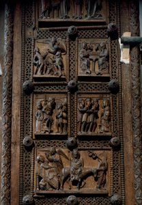 Arte románico: puerta de madera de mediados del siglo XII de la Iglesia de Santa María del Capitolio en Colonia, Alemania (Sankt Maria im Kapitol, Köln). Escenas que representan el anuncio a los pastores, la natividad, la adoración de los magos y la de Romanesque