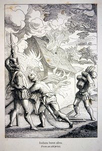 Los españoles en América quemando una aldea india