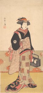 El actor Iwai Hanshiro IV como una mujer en un kimono negro, ca. 1780 de Shunsho
