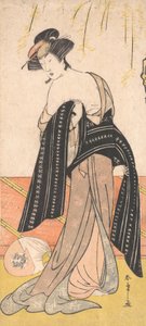 El actor Nakamura Riko como una oiran atando su obi
