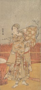 El actor Sawamura Sojuro III levantando un trozo de brocado de Shunsho