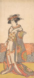 El tercer Segawa Kikunojo como una mujer de pie en una habitación con un zócalo con patrón de olas, ca. 1779 de Shunsho