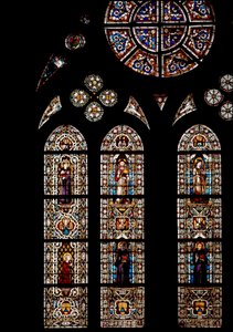 En la parte superior símbolos de los Evangelistas, abajo San Ludovico de Tolosa (Luis de Anjou o San Luis de Tolosa)