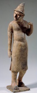 Arte chino: estatuilla de terracota sogdiana, bárbara con sombrero puntiagudo llevando seda (del actual Uzbekistán)