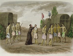 Un esclavo indígena de la tribu Tupinamba es bautizado por un sacerdote jesuita, cerca de Bahía, en 1550. de Spanish School