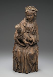 Figura sentada de la Virgen sosteniendo al niño Cristo