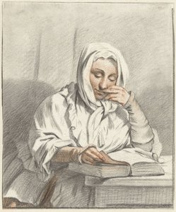 Mujer joven leyendo en una mesa de Taco Scheltema (I)