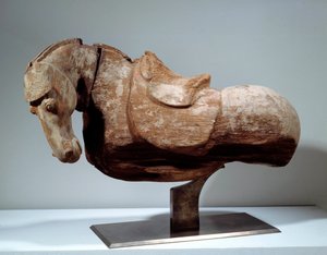 Arte chino: caballo de madera. Escultura del período Tang (618 a 907). París, Museo Cernuschi.