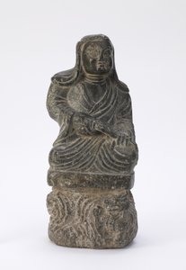 Pequeña estatua de un sacerdote budista