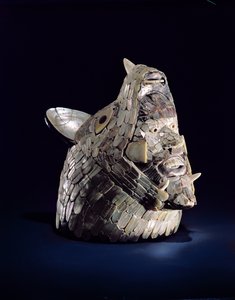 Cabeza de un animal con cabeza humana en las fauces abiertas, encontrado en Tula, Hidalgo, México, Postclásico Temprano (900-1250)
