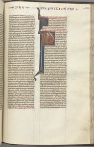 Fol. 452r, Filipenses, inicial historiada P, Pablo de pie con una espada y un pergamino, hablando con t