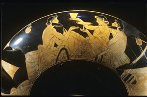 Escena de simposio en una copa de vino ático de figuras rojas, siglo V a.C.