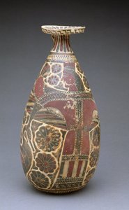 Alabastrón corintio de figuras negras, con una 