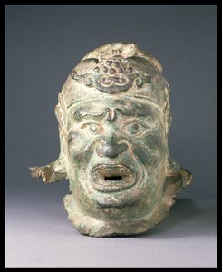 Cabeza de una figura guardiana, de la entrada de una tumba o templo, posiblemente un `dvarapala