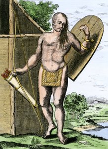 Historia de los pueblos indígenas: Un indio de Canadá sostiene un escudo, un arco y flechas en un carcaj