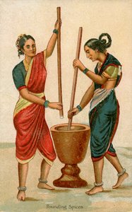 Mujeres indias triturando especias