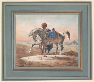árabe de pie junto a un caballo