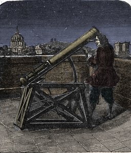 Isaac Newton (1642-1727) físico inglés usando su telescopio