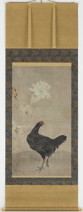 Gallina negra y un girasol