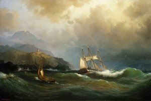 Una fragata arañando una costa rocosa