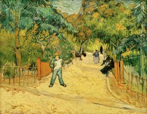 Entrada al parque en Arles con paseantes