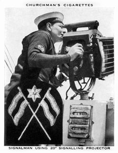 Señalero usando proyector de señales 20, 1937