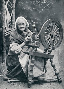 Una anciana irlandesa en su rueca, 1912 de W. Lawrence