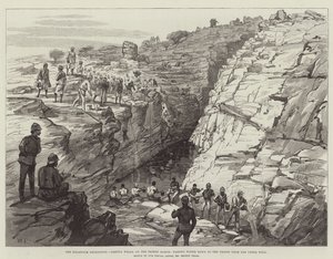 La expedición de Jartum, Gakdul Wells, en la marcha por el desierto, pasando agua a las tropas desde el pozo superior de Walter Paget