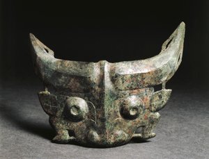 Máscara ritual que representa a Taotie, China, Dinastía Zhou Occidental de Western Zhou Dynasty Chinese School