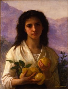 Niña sosteniendo limones