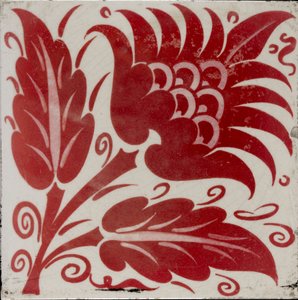 Azulejo con flor estilizada con dos hojas y zarcillos de William Frend De Morgan