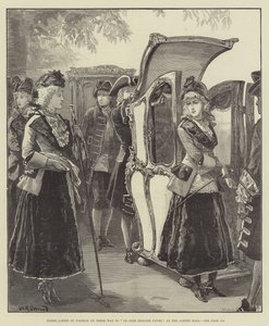 Tres damas de moda en su camino a la Feria Inglesa Antigua, en el Albert Hall