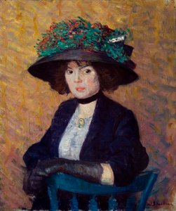 mujer con sombrero verde