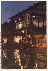La calle Kagurazaka de noche, después de la lluvia