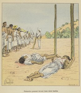 Fahavalos pasando frente a sus jefes fusilados