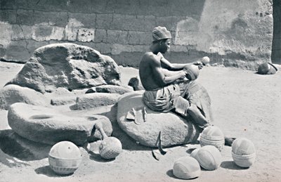 Un hombre Yoruba grabando cuencos de arcilla y jarras de agua, interior de Lagos, sur de Nigeria, 1912 de A. W. Gelston