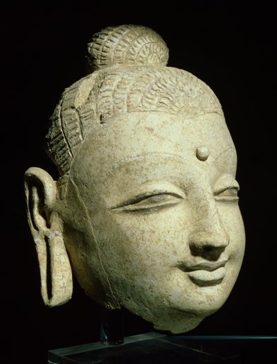 Cabeza de un Buda sonriente, estilo greco-budista, de Afganistán, siglo I-IV de Afghan School